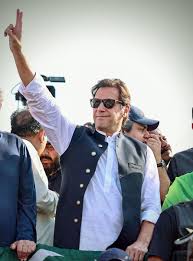 Imran Khan in a vest and sunglasses